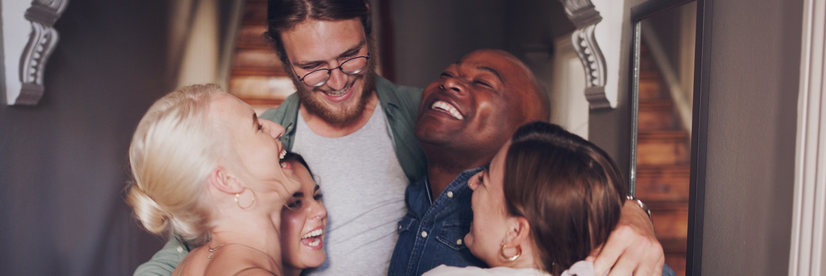 Friends hugging in circle